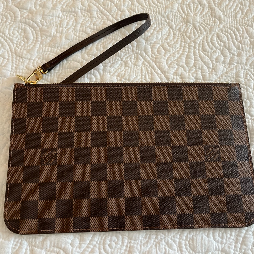 Authentic Louis Vuitton Neverfull Danier wristlet.